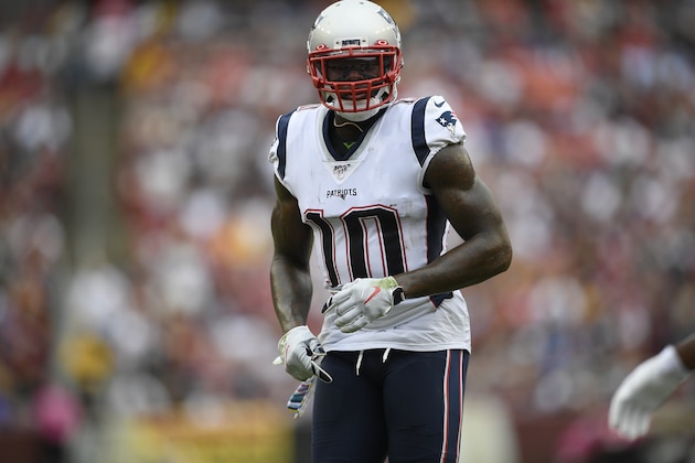 New England Patriots wide receiver Josh Gordon stands on the field during the first half of an NFL football game against the Washington Redskins, Sunday, Oct. 6, 2019, in Washington. (AP Photo/Nick Wass)