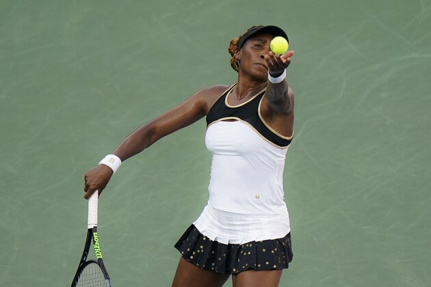 Venus Williams, of the United States, serves to Dayana Yastremska, of Ukraine, at the Western & Southern Open tennis tournament, Saturday, Aug. 22, 2020, in New York. (AP Photo/Frank Franklin II)