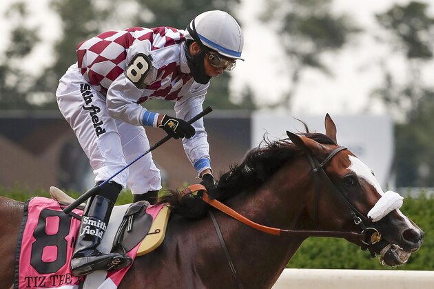 Jockey Manny Franco reacts after winning the 152nd running of the Belmont Stakes horse race atop Tiz the Law, Saturday, June 20, 2020, in Elmont, N.Y. (AP Photo/Seth Wenig)