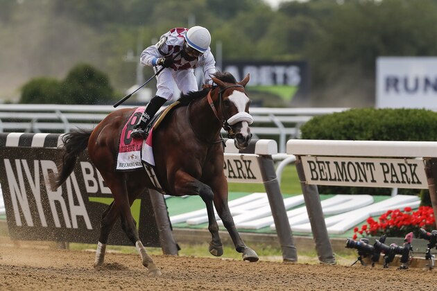 Tiz the Law (8), with jockey Manny Franco up, crosses the finish line to win the152nd running of the Belmont Stakes horse race, Saturday, June 20, 2020, in Elmont, N.Y. (AP Photo/Seth Wenig)