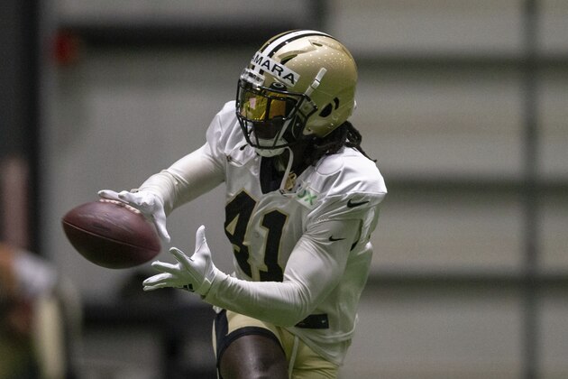 New Orleans Saints running back Alvin Kamara (41) catches the ball  during an NFL football training camp practice in Metairie, La., Wednesday, Aug. 19, 2020. (David Grunfeld/The Advocate via AP, Pool)