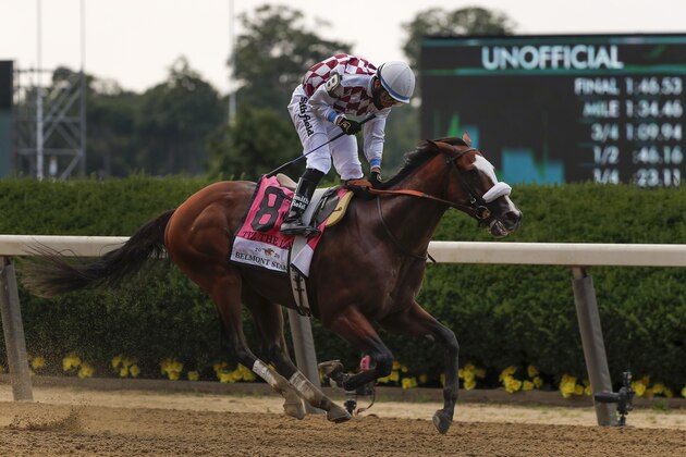 Jockey Manny Franco reacts after winning the 152nd running of the Belmont Stakes horse race atop Tiz the Law, Saturday, June 20, 2020, in Elmont, N.Y. (AP Photo/Seth Wenig)