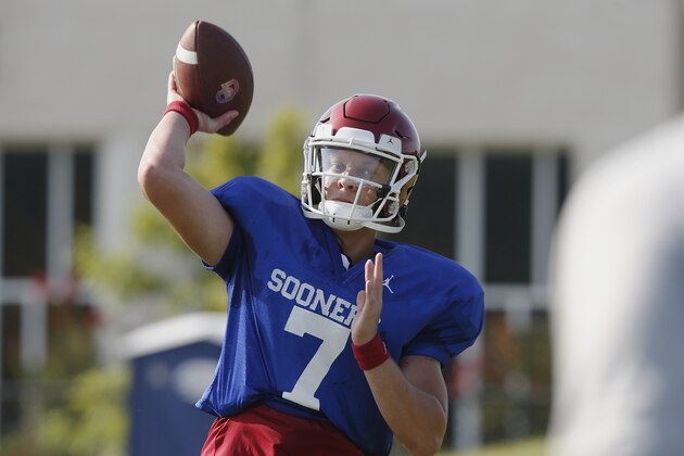 Oklahoma quarterback Spencer Rattler (7) throws during an NCAA college football practice in Norman, Okla., Monday, Aug. 5, 2019. (AP Photo/Sue Ogrocki)