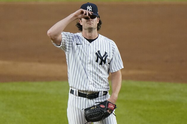 New York Yankees starting pitcher Gerrit Cole (45) reacts after allowing a two-run home run to Tampa Bay Rays' Ji-Man Choi during the first inning of a baseball game, Monday, Aug. 31, 2020, at Yankee Stadium in New York. Cole was the losing pitcher in the Yankees' 5-3 loss to Tampa Bay. (AP Photo/Kathy Willens)
