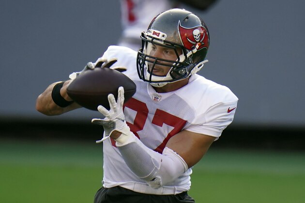 Tampa Bay Buccaneers tight end Rob Gronkowski (87) makes a catch during an NFL football training camp practice Friday, Aug. 28, 2020, in Tampa, Fla. (AP Photo/Chris O'Meara)