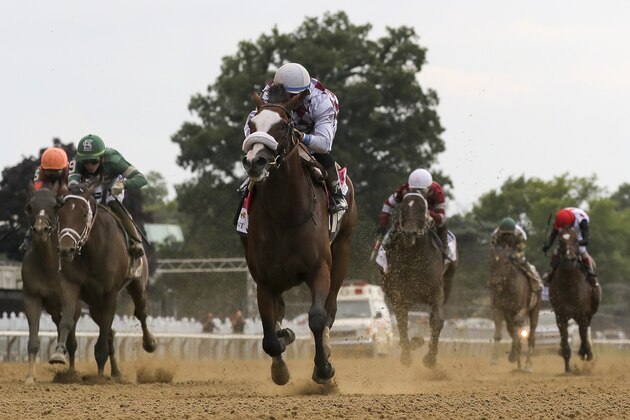 Tiz the Law, center, with jockey Manny Franco up, crosses the finish line to win the152nd running of the Belmont Stakes horse race, Saturday, June 20, 2020, in Elmont, N.Y. (AP Photo/Seth Wenig) Tiz the Law, center, with jockey Manny Franco up, crosses the finish line to win the152nd running of the Belmont Stakes horse race, Saturday, June 20, 2020, in Elmont, N.Y. (AP Photo/Seth Wenig)