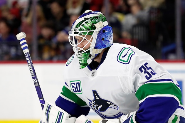 Vancouver Canucks goaltender Thatcher Demko (35) defends the goal during the second period of an NHL hockey game against the Carolina Hurricanes in Raleigh, N.C., Sunday, Feb. 2, 2020. (AP Photo/Gerry Broome) Vancouver Canucks goaltender Thatcher Demko (35) defends the goal during the second period of an NHL hockey game against the Carolina Hurricanes in Raleigh, N.C., Sunday, Feb. 2, 2020. (AP Photo/Gerry Broome)