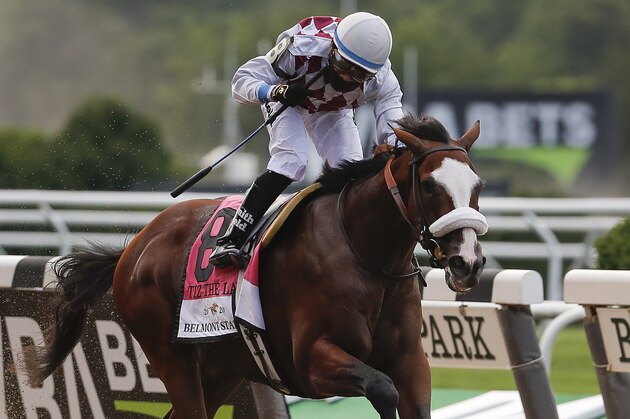 Tiz the Law (8), with jockey Manny Franco up, crosses the finish line to win the152nd running of the Belmont Stakes horse race, Saturday, June 20, 2020, in Elmont, N.Y. (AP Photo/Seth Wenig)