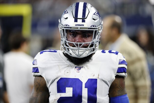 Dallas Cowboys running back Ezekiel Elliott walks on the sideline during the second half of an NFL football game against the Buffalo Bills in Arlington, Texas, Thursday, Nov. 28, 2019. (AP Photo/Roger Steinman)