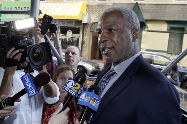 FILE - In this April 11, 2017, file photo, former New York Knicks star Charles Oakley talks to the press after an appearance in Manhattan Criminal Court, in New York. Oakley has sued the team's owners, saying he was defamed when they claimed he committed assault and was an alcoholic. The lawsuit details how Oakley was treated before and after he was forcefully removed from Madison Square Garden during a Feb. 8 game. The lawsuit filed Tuesday, Sept. 12, 2017, seeks unspecified damages. (AP Photo/Richard Drew, File)