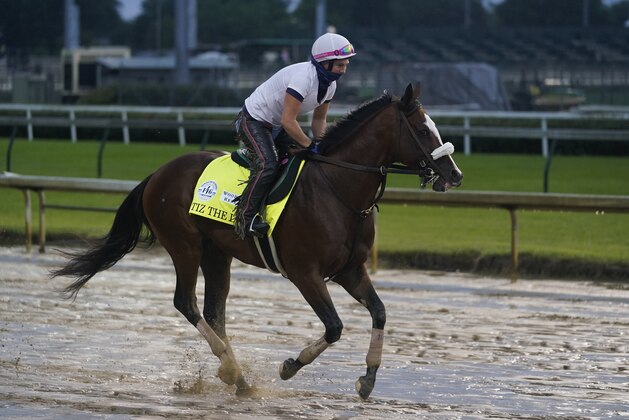 Kentucky Derby entry Tiz the Law runs during a workout at Churchill Downs, Wednesday, Sept. 2, 2020, in Louisville, Ky. The 146th running of the Kentucky Derby is scheduled for Saturday, Sept. 5. (AP Photo/Darron Cummings)