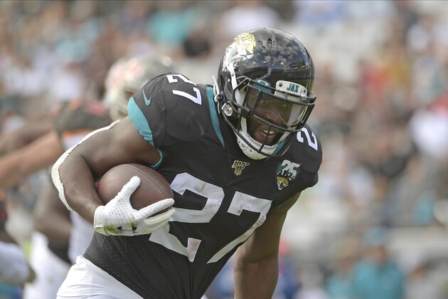 Jacksonville Jaguars running back Leonard Fournette (27) runs against the Tampa Bay Buccaneers during the first half of an NFL football game, Sunday, Dec. 1, 2019, in Jacksonville, Fla. (AP Photo/Phelan M. Ebenhack)