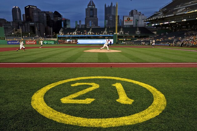 The uniform number of Pittsburgh Pirates Hall of Fame right fielder Roberto Clemente is painted on PNC Park field as part of Roberto Clemente Day, during a baseball game between the Pirates and the Cincinnati Reds in Pittsburgh, Wednesday, Sept. 5, 2018. (AP Photo/Gene J. Puskar)