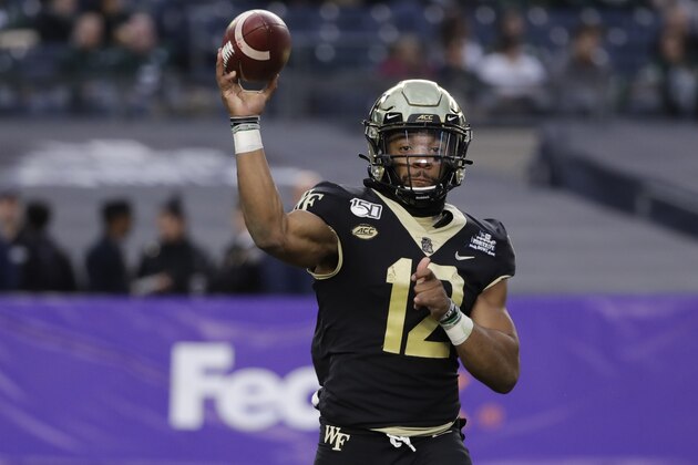 Wake Forest quarterback Jamie Newman (12) throws a pass during the first half of the Pinstripe Bowl NCAA college football game against Michigan State Friday, Dec. 27, 2019, in New York. (AP Photo/Frank Franklin II) Wake Forest quarterback Jamie Newman (12) throws a pass during the first half of the Pinstripe Bowl NCAA college football game against Michigan State Friday, Dec. 27, 2019, in New York. (AP Photo/Frank Franklin II)