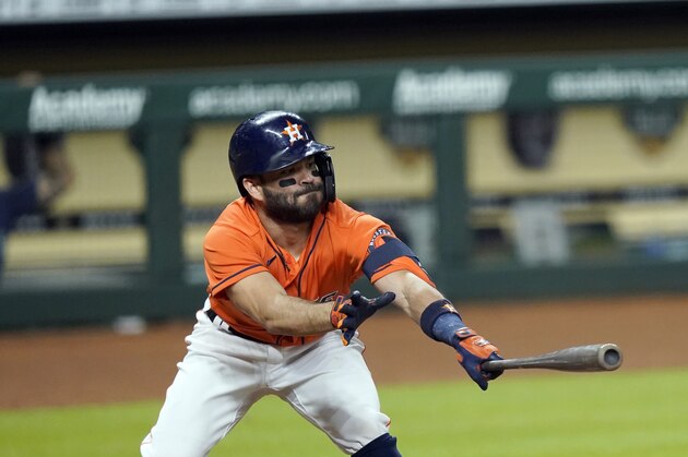 Houston Astros' Jose Altuve bats against the Seattle Mariners during the third inning of a baseball game Friday, Aug. 14, 2020, in Houston. (AP Photo/David J. Phillip)