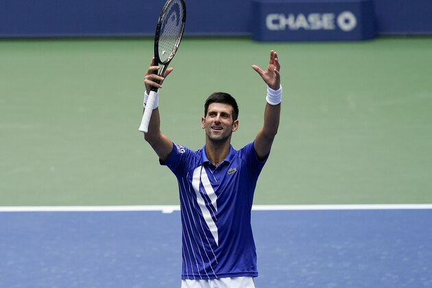 Novak Djokovic, of Serbia, reacts after defeating Kyle Edmund, of Great Britain, during the second round of the US Open tennis championships, Wednesday, Sept. 2, 2020, in New York. (AP Photo/Seth Wenig)