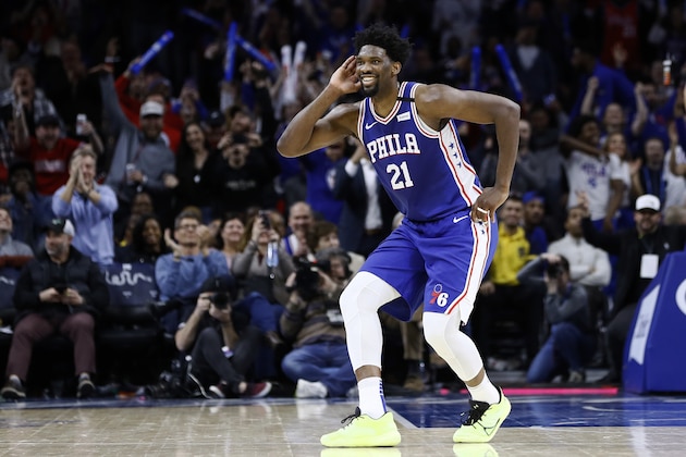 FILE - In this Feb. 24, 2020, file photo, Philadelphia 76ers' Joel Embiid celebrates after a three-point basket during the second half of an NBA basketball game against the Atlanta Hawks in Philadelphia. 76ers coach Brett Brown says All-Stars Ben Simmons and Joel Embiid are healthy for the NBA restart. (AP Photo/Matt Slocum, File)