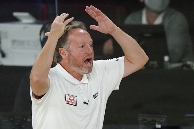 Milwaukee Bucks head coach Mike Budenholzer reacts during the second half of an NBA conference semifinal playoff basketball game against the Miami Heat Wednesday, Sept. 2, 2020, in Lake Buena Vista, Fla. (AP Photo/Mark J. Terrill)