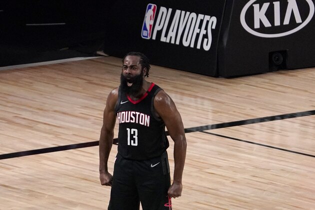 Houston Rockets' James Harden (13) celebrates after blocking a 3-point shot attempt by Oklahoma City Thunder's Luguentz Dort (5) during the second half of an NBA first-round playoff basketball game in Lake Buena Vista, Fla., Wednesday, Sept. 2, 2020. (AP Photo/Mark J. Terrill)