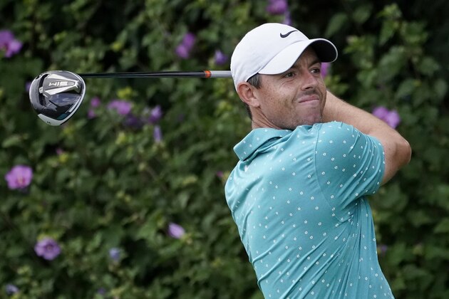 Rory McIlroy, of Northern Ireland, hits from the first tee during the final round of the BMW Championship golf tournament at the Olympia Fields Country Club in Olympia Fields, Ill., Sunday, Aug. 30, 2020. (AP Photo/Charles Rex Arbogast)