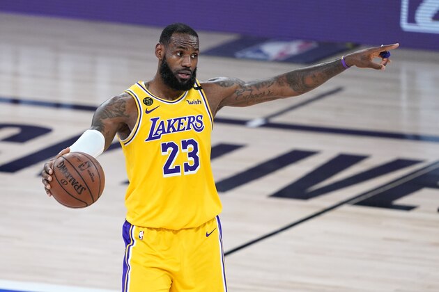 Los Angeles Lakers' LeBron James directs the play during the second half of an NBA basketball first round playoff game against the Portland Trail Blazers Saturday, Aug. 29, 2020, in Lake Buena Vista, Fla. (AP Photo/Ashley Landis)