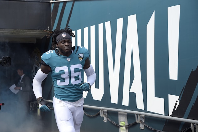 Jacksonville Jaguars defensive back Ronnie Harrison (36) runs onto the field during player introductions before an NFL football game against the New Orleans Saints Sunday, Oct. 13, 2019, in Jacksonville, Fla. (AP Photo/Phelan M. Ebenhack)