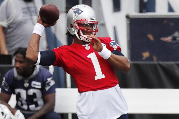 New England Patriots quarterback Cam Newton (1) warms up before an NFL football training camp scrimmage, Friday, Aug. 28, 2020, in Foxborough, Mass. (AP Photo/Michael Dwyer, Pool)