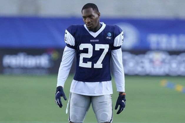Dallas Cowboys Ha Ha Clinton-Dix (27) stand on the field during NFL football practice in Frisco, Texas, Thursday, Aug. 20, 2020. (AP Photo/LM Otero)