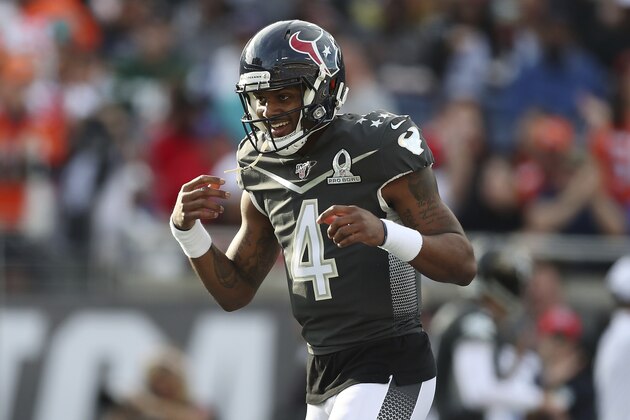AFC quarterback Deshaun Watson, of the Houston Texans, reacts after scoring a touchdown during the NFL Pro Bowl football game against the NFC, Sunday, Jan. 26, 2020, in Orlando, Fla. (AP Photo/Steve Luciano)