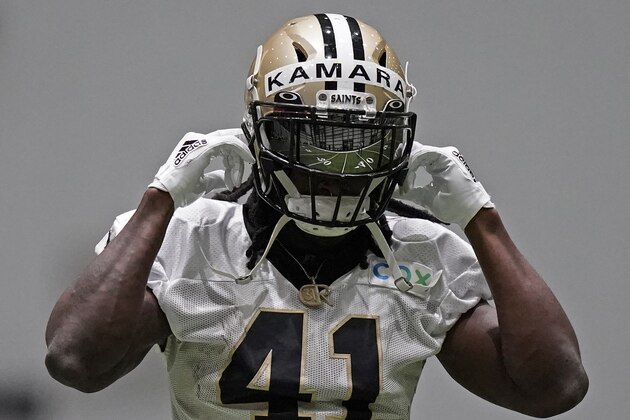 The field is reflected in the visor of New Orleans Saints running back Alvin Kamara (41) during practice at their NFL football training facility in Metairie, La., Wednesday, Sept. 2, 2020. (AP Photo/Gerald Herbert, Pool)