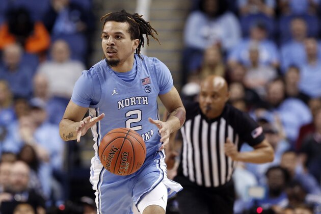 North Carolina guard Cole Anthony (2) dribbles against Syracuse during the first half of an NCAA college basketball game at the Atlantic Coast Conference tournament in Greensboro, N.C., Wednesday, March 11, 2020. (AP Photo/Ben McKeown)