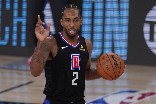 Los Angeles Clippers' Kawhi Leonard (2) gestures in the second half of an NBA conference semifinal playoff basketball game against the Denver Nuggets Thursday, Sept 3, 2020, in Lake Buena Vista Fla. (AP Photo/Mark J. Terrill)