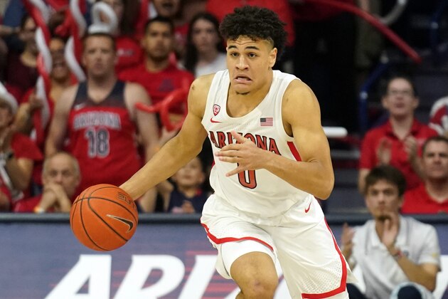 Arizona guard Josh Green (0) during the first half of an NCAA college basketball game against Washington Saturday, March 7, 2020, in Tucson, Ariz. (AP Photo/Rick Scuteri)