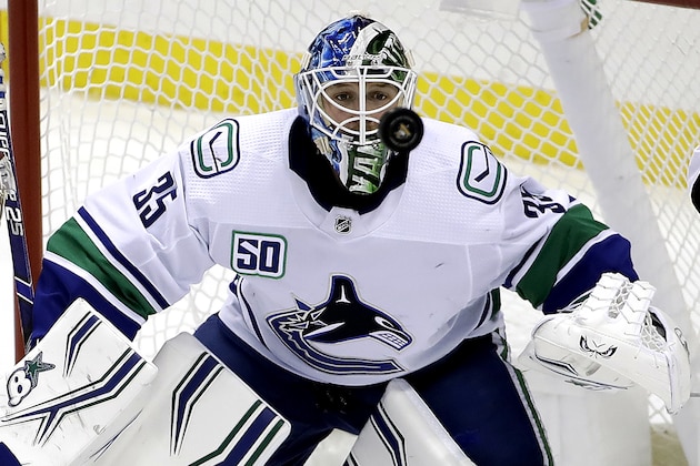 Vancouver Canucks goaltender Thatcher Demko watches the puck during the third period of the team's NHL hockey game against the Pittsburgh Penguins in Pittsburgh, Wednesday, Nov. 27, 2019. The Penguins won 8-6. (AP Photo/Gene J. Puskar)