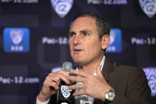 Pac-12 Commissioner Larry Scott speaks to reporters during the Pac-12 Conference women's NCAA college basketball media day, Monday, Oct. 7, 2019, in San Francisco. (AP Photo/D. Ross Cameron)