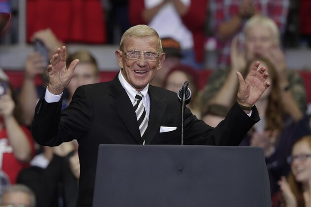 Former Notre Dame football coach Lou Holtz speaks at a campaign rally featuring President Donald Trump at the Allen County War Memorial Coliseum in Fort Wayne, Ind., Monday, Nov. 5, 2018. (AP Photo/Michael Conroy)