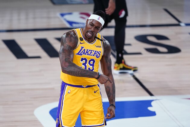 Los Angeles Lakers center Dwight Howard (39) reacts after a slam dunk during the first half of an NBA basketball game against the Portland Trail Blazers Tuesday, Aug. 18, 2020, in Lake Buena Vista, Fla. (AP Photo/Ashley Landis, Pool)