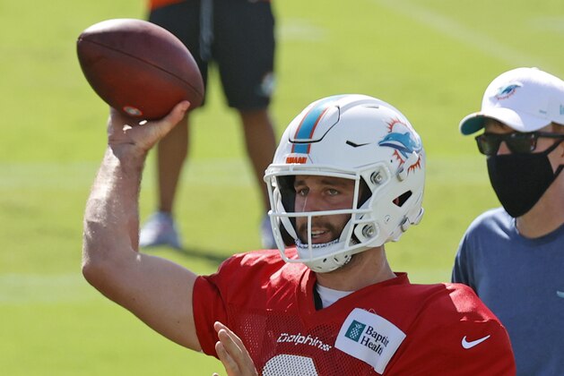 Miami Dolphins quarterback Josh Rosen (3) throws the ball during practice at NFL football training camp in Davie, Fla., Tuesday, Aug. 18, 2020. (AP Photo/Joel Auerbach)