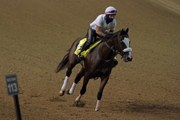 Kentucky Derby entry Tiz The Law runs during an early-morning workout at Churchill Downs, Friday, Sept. 4, 2020, in Louisville, Ky. The Kentucky Derby is scheduled for Saturday, Sept. 5th. (AP Photo/Charlie Riedel)