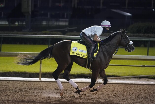 Kentucky Derby entry Tiz the Law runs during a workout at Churchill Downs, Friday, Sept. 4, 2020, in Louisville, Ky. The Kentucky Derby is scheduled for Saturday, Sept. 5th. (AP Photo/Darron Cummings)