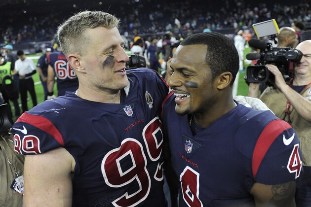 Houston Texans defensive end J.J. Watt (99) and quarterback Deshaun Watson (4) following an NFL football game against the Miami Dolphins, Thursday, Oct. 25, 2018, in Houston. (AP Photo/Eric Christian Smith)