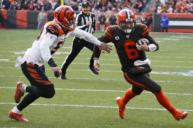 Cleveland Browns quarterback Baker Mayfield (6) rushes for a 7-yard touchdown during the first half of an NFL football game against the Cincinnati Bengals, Sunday, Dec. 8, 2019, in Cleveland. (AP Photo/Ron Schwane)