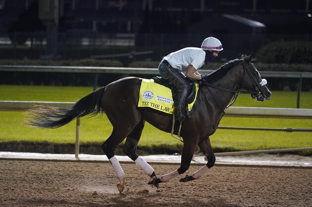 Kentucky Derby entry Tiz the Law runs during a workout at Churchill Downs, Friday, Sept. 4, 2020, in Louisville, Ky. The Kentucky Derby is scheduled for Saturday, Sept. 5th. (AP Photo/Darron Cummings)