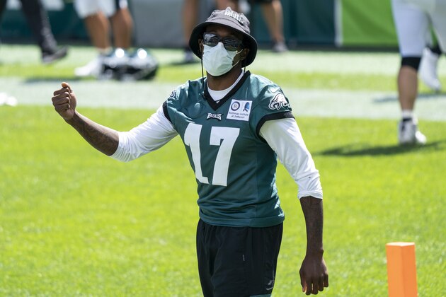 Philadelphia Eagles wide receiver Alshon Jeffery reacts as he heads onto the field during an NFL football practice, Sunday, Aug. 30, 2020, in Philadelphia. (AP Photo/Chris Szagola, Pool)
