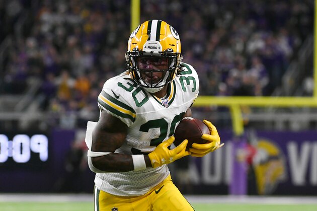 Green Bay Packers running back Jamaal Williams catches a pass during the first half of an NFL football game against the Minnesota Vikings, Monday, Dec. 23, 2019, in Minneapolis. (AP Photo/Craig Lassig)