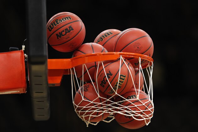 Basketballs fill a net before a second round women's college basketball game between Iowa and Missouri in the NCAA Tournament, Sunday, March 24, 2019, in Iowa City, Iowa. (AP Photo/Charlie Neibergall)