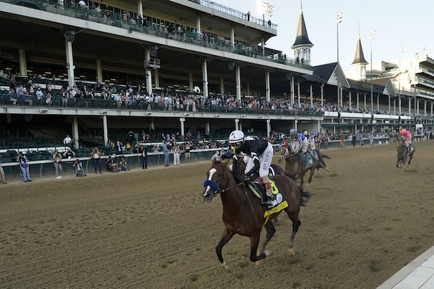 Jockey John Velazquez riding Authentic, wins the 146th running of the Kentucky Derby at Churchill Downs, Saturday, Sept. 5, 2020, in Louisville, Ky. (AP Photo/Jeff Roberson)