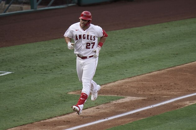 Los Angeles Angels' Mike Trout rounds the bases after hitting a two-run home run during the third inning of the first baseball game of a doubleheader against the Houston Astros, Saturday, Sept. 5, 2020, in Anaheim, Calif. (AP Photo/Jae C. Hong)