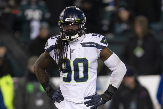 Seattle Seahawks defensive end Jadeveon Clowney (90) looks on during an NFL wild-card playoff football game against the Philadelphia Eagles, Sunday, Jan. 5, 2020, in Philadelphia. Seattle won 17-9. (AP Photo/Chris Szagola)
