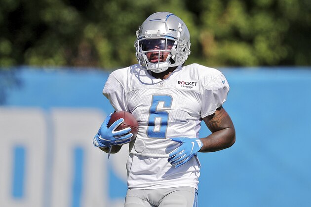 Detroit Lions running back D'Andre Swift (6) jogs out a drill after catching a pass during NFL football training camp in Allen Park, Mich., Tuesday, Aug. 18, 2020. (Mike Mulholland/The Grand Rapids Press via AP, Pool)